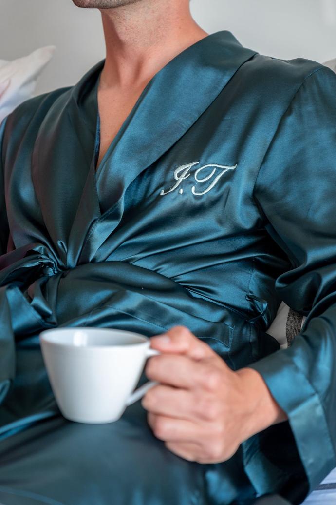 Man in kimono relaxing with a coffee