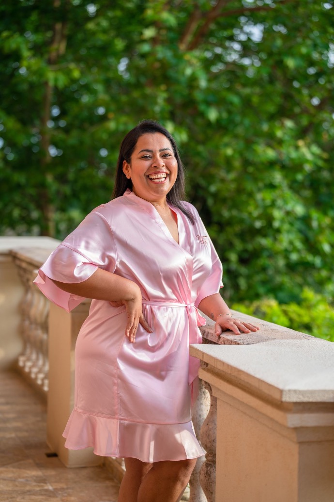 Woman in kimono smiling on her terrace